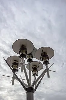 Lamp Post Prints: Artistic view of street light against a backdrop of cloudy sky