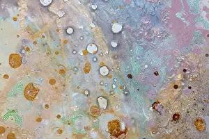 Artists oil paints multicolored closeup abstract background. Parts in the universe