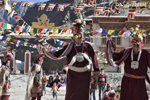 Ladakh Prints: Aryan (Brogpa) men dancing at a traditional festival, Biama village, Ladakh, India