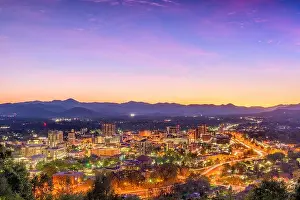 Asheville, North Carolina, USA skyline over downtown with the Blue Ridge Mountains