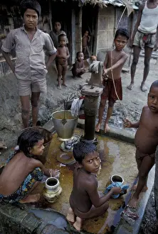Water Pump Prints: Asia, Bangladesh, Dhaka Children pumping water