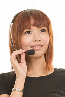 Dreaming Prints: Asian female wearing a headset with microphone