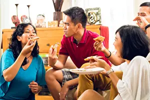 Middle Class Prints: Asian people eating pizza at party or dinner and smiling