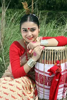 Assamese Prints: Assamese girl in traditional costume during Bihu celebration