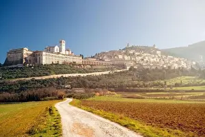 Assisi, Italy town skyline with the Basilica of Saint Francis of Assisi