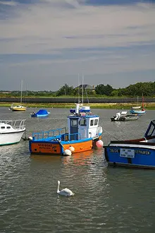 Assorted yachts and dingies in Keyhaven harbour Hampshire England UK