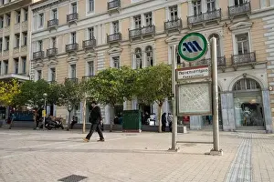 Day Sky Prints: Athens, Greece. November 2021. The Panepistimio metro station sign in the city center