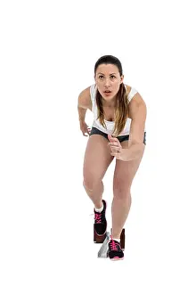 Athleticism Prints: Athlete woman in ready to run position