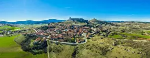 Castilla La Prints: Atienza aerial panorama with blue sky of medieval ruined castle and town with city walls in Castille and Leon Spain