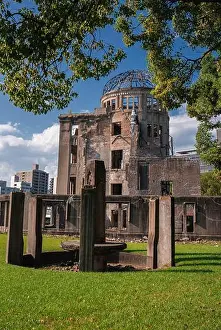 Hiroshima Prints: Atomic Bomb Dome behind stone monument at Hiroshima Peace Park