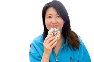 On White Prints: attractive asian lady eating a donut