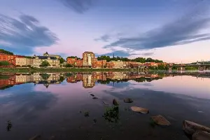 Augusta, Maine, USA downtown skyline on the Kennebec River at twilight