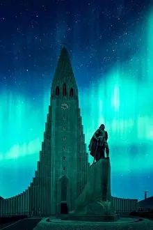 Aurora borealis Northern lights shining over the church Hallgrimskirkja in Reykjavik. Landscape photography