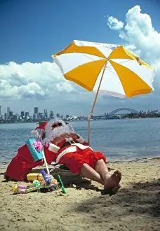 Reclining Prints: Australia. Sydney. Christmas in summer. Santa Claus at the beach