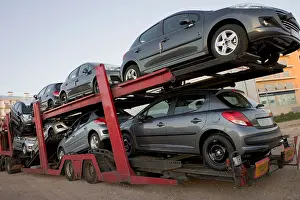 Transporter Prints: Automobile transport truck carrying new cars to be delivered