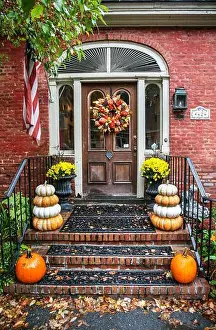 Doorstep Prints: Autumn decorations on a front door and steps