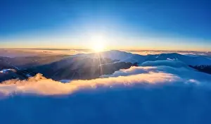 Sky Clouds Prints: Autumn flight through blue sky in Carpatian autumn mountains aerial panoramic drone shot