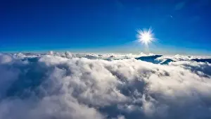 Cloud Sky Prints: Autumn flight through blue sky in Carpatian autumn mountains aerial panoramic drone shot