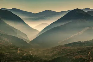Slopes Prints: Autumn scenery of the misty valleys of the Abruzzo mountain ranges at dawn