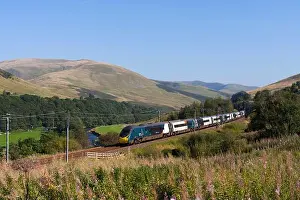 Fast Prints: Avanti west coast Alstom pendolino train 390050 running through the scenic Lune Gorge (south of Tebay)