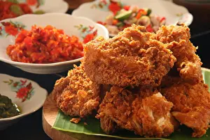 Balinese Prints: Ayam Geprek. Fusion street food of southern fried chicken with traditional spicy condiment from Indonesian regional