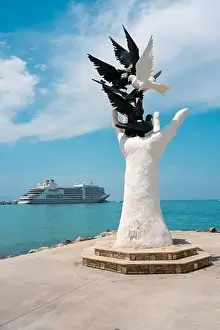 Cruise Vacation Prints: Aydin Kusadasi, Turkey - 4 July 2024: Hand of Peace Sculpture and cruise ship behind it in Kusadasi Aydin