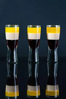 Liquor Prints: B-52 cocktail - layered shot composed of coffee liqueur, Irish cream and orange liqueur