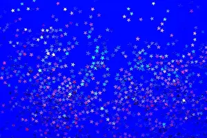 Defocused Prints: Background from shining little stars on a blue background