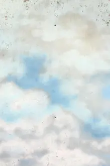 Day Building Prints: Background texture of wall with graffiti paintings. Blue cloudy sky