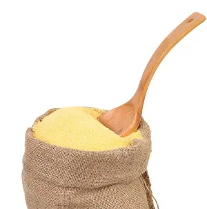 Carbohydrates Prints: bag of ground corn and a wooden spoon