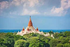 Bagan, Myanmar ancient temple ruins landscape with Ananda in the teplearchaeological zone at dusk