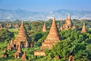 Bagan, Myanmar ancient temple ruins landscape in the archaeological zone at dusk