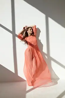 Poses Prints: Ballet dancer wearing a red dress leaning against a wall in a dance pose