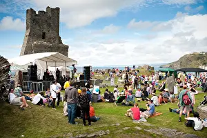 Aberystwyth Prints: A band playing on stage, Roc y Castell / Castle Rock free music festival Aberystwyth Wales UK