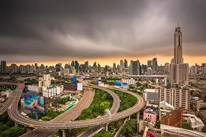 Bangkok, Thailand urban cityscape and office towers at dusk