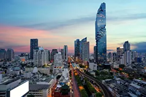 Bangkok Transportation at Dusk with Modern Business Building from top view in Bangkok, Thailand