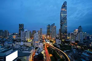 Bangkok Transportation at Dusk with Modern Business Building from top view in Bangkok, Thailand