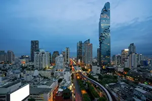 Bangkok Transportation at Dusk with Modern Business Building from top view in Bangkok, Thailand