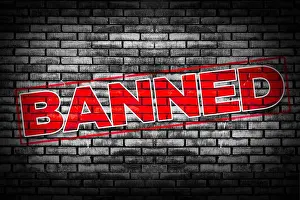 Prohibited Prints: Banned Typography in Red Written on the Gray Wall Background
