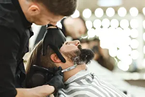 Razor Prints: Barber making beard form for man
