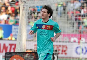 Liga Prints: Barcelona´s soccer player Lionel Messi gestures during a match