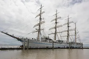 Stern Prints: Barefoot cadets scrambling down the ratlines from the masts after the farewell salute