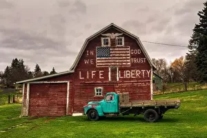 Palouse Prints: A barn located in a small town of the Palouse Region of Eastern Washington with a USA Flag