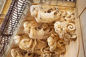 Baroque details of balcony decoration at the Palazzo Villadorata (Palazzo Nicolaci), Noto old town, Sicily, Italy UNESCO