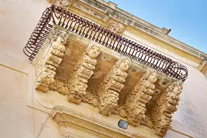 Baroque details of balcony at the Palazzo Villadorata (Palazzo Nicolaci), Noto old town, Sicily, Italy UNESCO