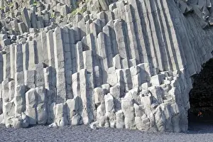 Volcanic Rock Prints: Basalt formations on a dark beach, Reynisfjare cave, Vik, South Iceland, Iceland