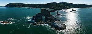 Aerial Landscape Collection: Basalt sea stacks lie just off the Northern Oregon shoreline, not far west of Portland