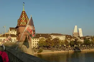 Rhein Prints: Basel, Switzerland - 17 Oktober 2021: people relaxing by the river Rhine at Basel in Switzerland