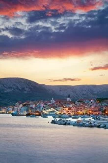 Sea Collection: Baska, Krk Island, Croatia. Cityscape image of Baska, Croatia located on Krk Island at summer sunset