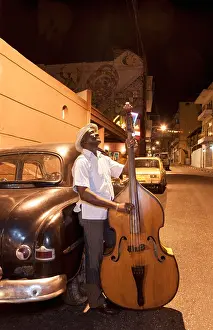 Practicing Prints: Bass player, Santiago de Cuba, Cuba, West Indies, Central America